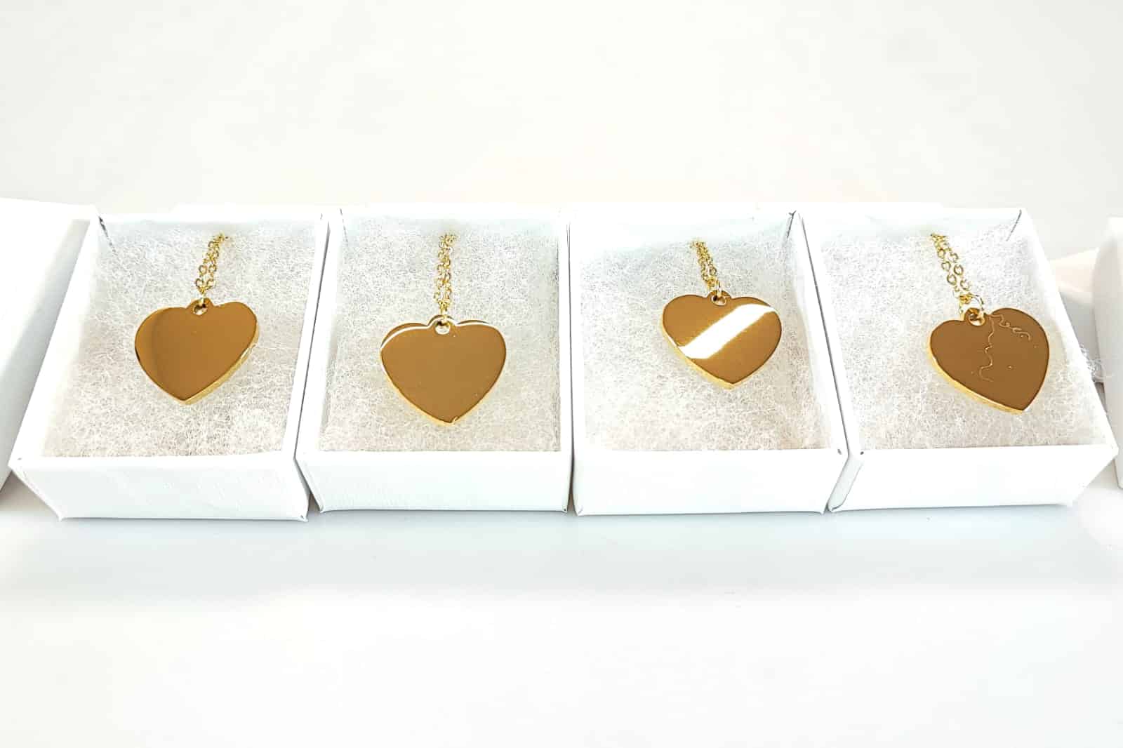 Toscani Gadget Collana cuore acciaio dorata incisa